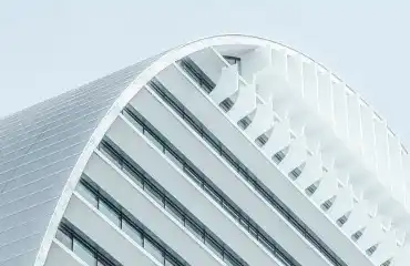 White curved building facade